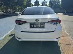 2021 Toyota Corolla Hybrid 1.8L E-CVT Elite, белый — фото 5