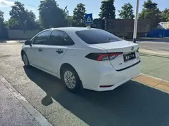 2021 Toyota Corolla Hybrid 1.8L E-CVT Elite, белый — фото 6