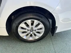 2021 Toyota Corolla Hybrid 1.8L E-CVT Elite, белый — фото 8