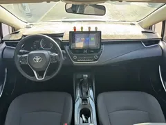 2021 Toyota Corolla Hybrid 1.8L E-CVT Elite, белый — фото 10