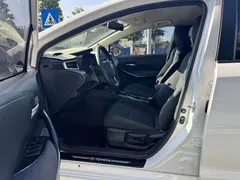 2021 Toyota Corolla Hybrid 1.8L E-CVT Elite, белый — фото 11