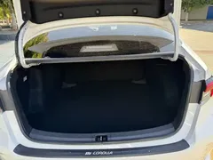 2021 Toyota Corolla Hybrid 1.8L E-CVT Elite, белый — фото 17