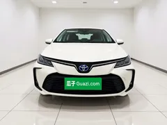 2021 Toyota Corolla Hybrid 1.8L E-CVT Elite, белый — фото 1