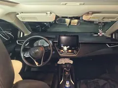 2021 Toyota Corolla Hybrid 1.8L E-CVT Elite, белый — фото 10