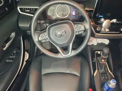 2021 Toyota Corolla Hybrid 1.8L E-CVT Elite, белый — фото 11