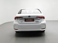 2021 Toyota Corolla Hybrid 1.8L E-CVT Elite, белый — фото 4