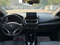 2021 Toyota Yaris L Zhixuan X 1.5L CVT Premium, белый — фото 12