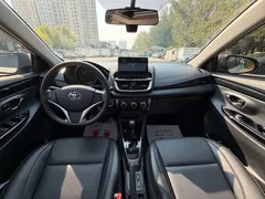 2021 Toyota Yaris L Zhixuan X 1.5L CVT Premium, белый — фото 14