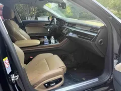 2021 Audi A8L 55 TFSI quattro Luxury, чёрный — фото 2