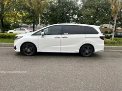 2024 Honda Odyssey 2.0L e:HEV, белый — фото 17