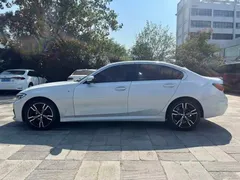 2022 BMW 3 Series 325i M Sport Package, белый — фото 11