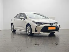 2021 Toyota Corolla Hybrid 1.8L E-CVT Elite, белый — фото 2