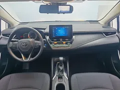 2021 Toyota Corolla Hybrid 1.8L E-CVT Elite, белый — фото 15