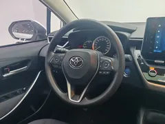 2021 Toyota Corolla Hybrid 1.8L E-CVT Elite, белый — фото 16