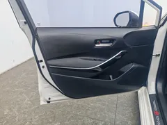 2021 Toyota Corolla Hybrid 1.8L E-CVT Elite, белый — фото 19