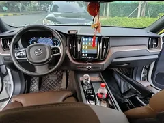 2023 Volvo XC60 4WD Luxury, белый — фото 10