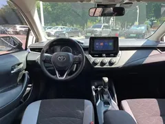 2023 Toyota Corolla 1.2T Pioneer, белый — фото 15
