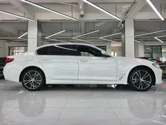 2023 BMW 5 Series 530Li Leading M Sport Package, белый — фото 9