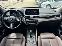 2021 BMW X1 Leading, зелёный — фото 9