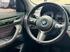 2021 BMW X1 Leading, зелёный — фото 16