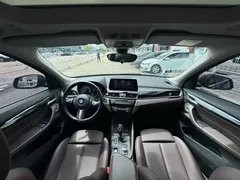 2021 BMW X1 Leading, зелёный — фото 19