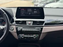 2021 BMW X1 Leading, зелёный — фото 20