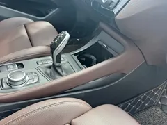 2021 BMW X1 Leading, зелёный — фото 27
