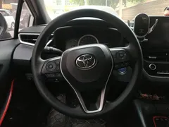 2021 Toyota Levin 1.8H Hybrid E-CVT Sport, белый — фото 15
