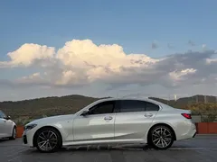 2021 BMW 3 Series 325Li M Sport Package, белый — фото 10