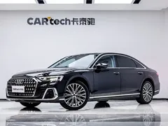 2023 Audi A8L 50 TFSI quattro Premium, чёрный — фото 1