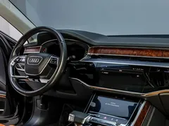 2023 Audi A8L 50 TFSI quattro Premium, чёрный — фото 14