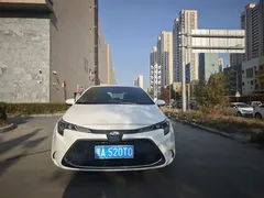 2022 Toyota Levin Hybrid 1.8H E-CVT Luxury, белый — фото 2