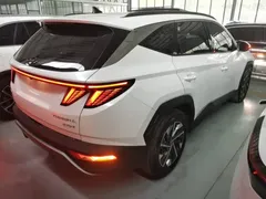 2021 Hyundai Tucson L 1.5T DCT GLX Elite, белый — фото 7