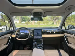 2023 Geely Atlas L 1.5TD DCT Luxury, белый — фото 6
