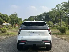 2023 Geely Atlas L 1.5TD DCT Luxury, белый — фото 11