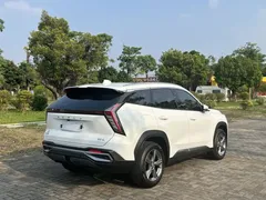 2023 Geely Atlas L 1.5TD DCT Luxury, белый — фото 12