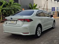 2021 Toyota Corolla Hybrid 1.8L E-CVT Elite, белый — фото 4