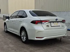 2021 Toyota Corolla Hybrid 1.8L E-CVT Elite, белый — фото 6