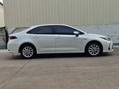 2021 Toyota Corolla Hybrid 1.8L E-CVT Elite, белый — фото 8