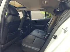 2021 Toyota Corolla Hybrid 1.8L E-CVT Elite, белый — фото 18