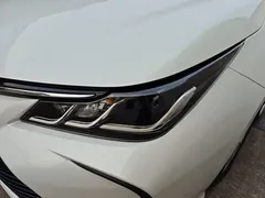2021 Toyota Corolla Hybrid 1.8L E-CVT Elite, белый — фото 34