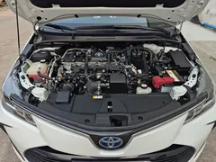 2021 Toyota Corolla Hybrid 1.8L E-CVT Elite, белый — фото 38