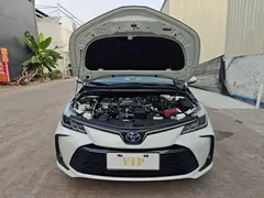 2021 Toyota Corolla Hybrid 1.8L E-CVT Elite, белый — фото 39