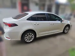 2021 Toyota Corolla 1.2T S-CVT Elite Plus, белый — фото 4