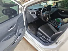 2021 Toyota Corolla 1.2T S-CVT Elite Plus, белый — фото 12
