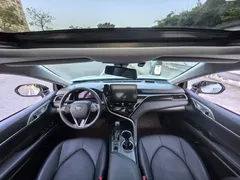 2021 Toyota Camry Hybrid 2.5HG Luxury, белый — фото 9