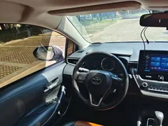 2021 Toyota Corolla 1.2T S-CVT Elite Plus, белый — фото 9