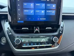 2021 Toyota Corolla 1.2T S-CVT Luxury, белый — фото 11