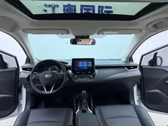 2021 Toyota Corolla 1.2T S-CVT Luxury, белый — фото 17