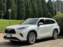 2022 Toyota Highlander Hybrid 2.5L 4WD Premium 7-seat, белый — фото 1
